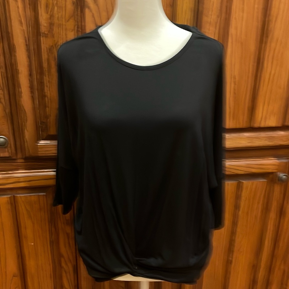 Gaze black jersey top with semi long sleeves.